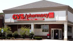 MOUNT PROSPECT, IL - JUNE 23: A woman walks into a CVS store June 23, 2005 in Mount Prospect, Illinois. CVS has introduced their new CVS One-Time-Use Video Camcorder, the world's first single-use point-and-shoot digital video camera. The under $30 camcorder, built on Pure Digital Technologies' imaging platform, can capture up to 20 minutes of digital quality video and sound. After its use, a consumer can return the camcorder to their local CVS and receive, that day, a DVD of their recorded efforts. (Photo by Tim Boyle/Getty Images)