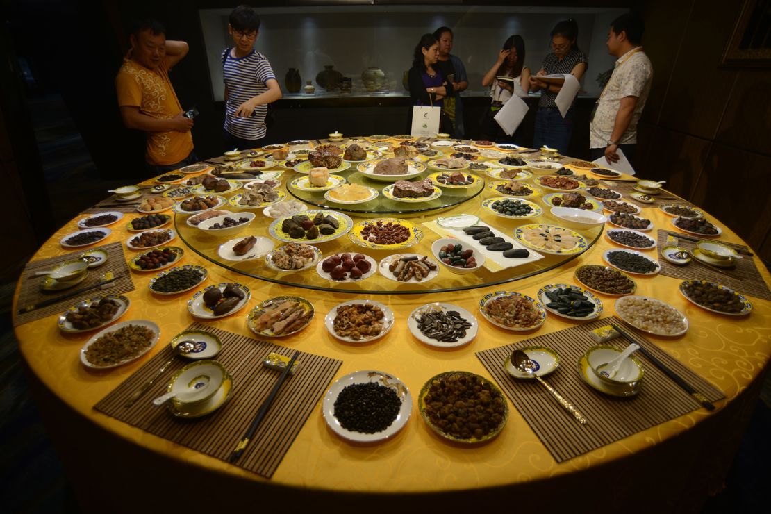 This display at a gem show in China, made of stones, was inspired by the Manchu Han Imperial Feast, which is often mistaken as a Forbidden City export.