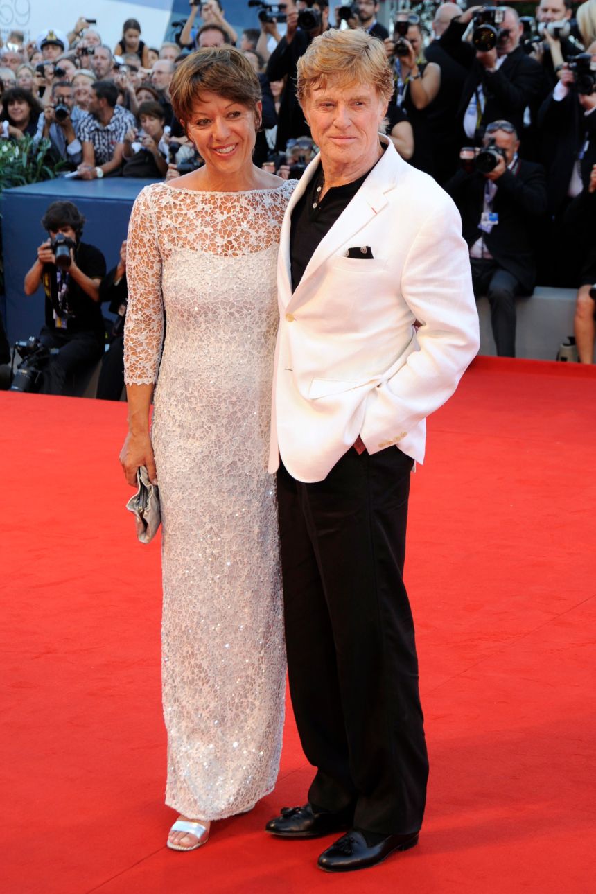 Redford, shown here with his wife Sibylle Szaggars at the Venice Film Festival in 2012, was still making menswear interesting with his mandarin collared shirt and tasselled loafers.