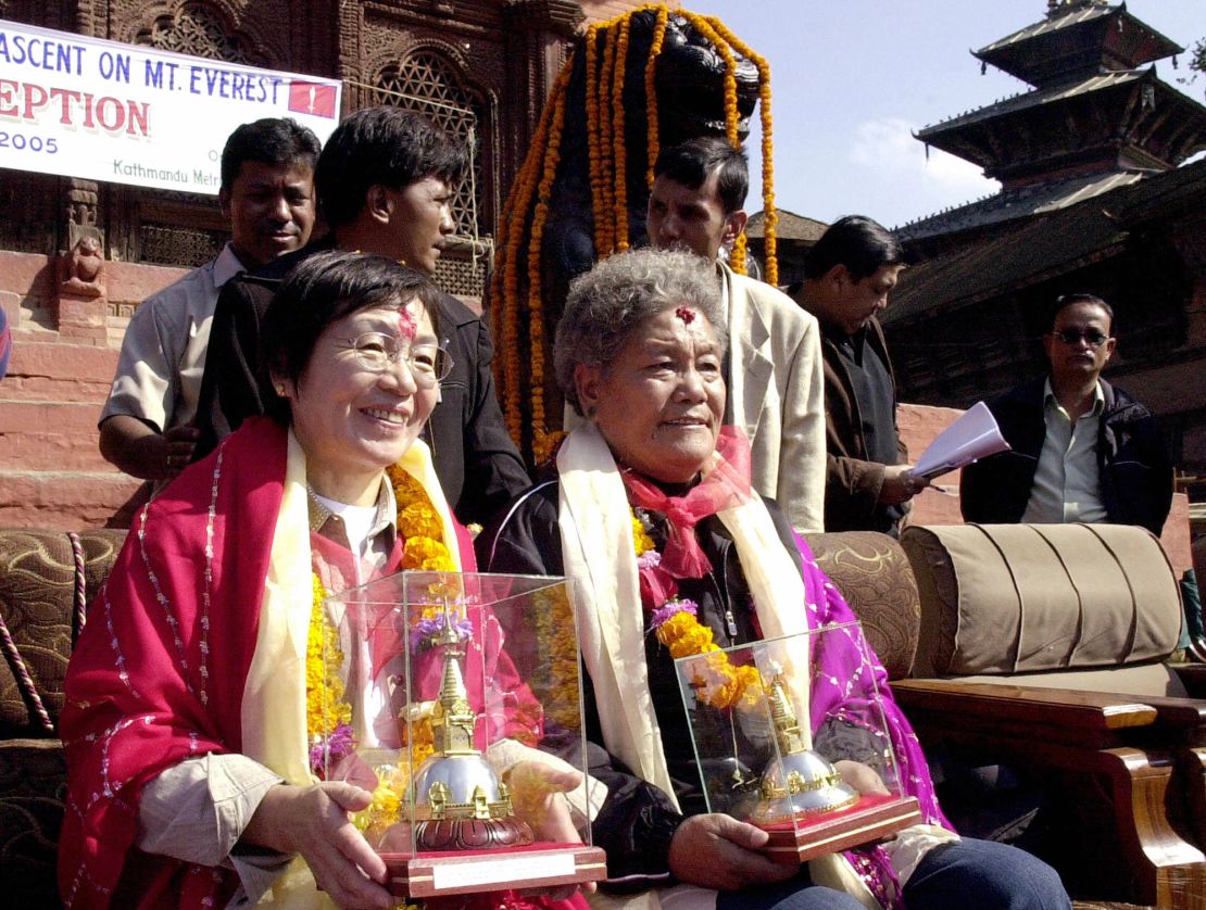 Junko Tabei (left) and China's Pang Duo — the second woman to reach the summit of Everest — attend a civic reception in Kathmandu, Nepal, in 2005 to celebrate the 30th anniversary of their achievement.
