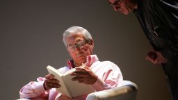 Madrid, SPAIN:  Peruvian author Mario Vargas Llosa (L) speaks with director Joan Olle during a dress rehearsal of his new play 'La verdad de las mentiras' in Madrid, 02 February 2006. Llosa wrote and stars in the play with Spanish actress Aitana Sanchez Gijon. AFP PHOTO/PIERRE-PHILIPPE MARCOU  (Photo credit should read PIERRE-PHILIPPE MARCOU/AFP via Getty Images)