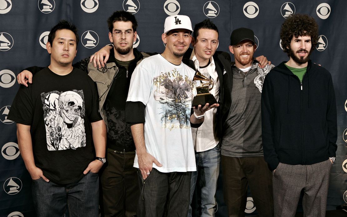 Linkin Park pose with their award for Best Rap/Sung Collaboration at the Grammy Awards in 2006.