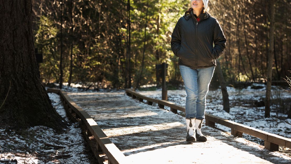 Walking outdoors can boost your mental health, according to research. If inclement weather is in the forecast, take it indoors and do laps in a local mall.