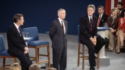 Presidential candidates Bill Clinton, left, Ross Perot, center, and President George Bush, right, participate in a debate in 1992.