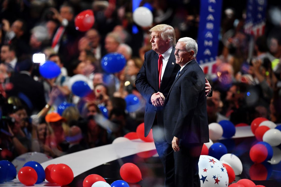 In this July 2016 photo, then-Republican presidential candidate Donald Trump and Republican vice presidential candidate Mike Pence acknowledge the crowd at the end of the Republican National Convention in Cleveland, Ohio. 