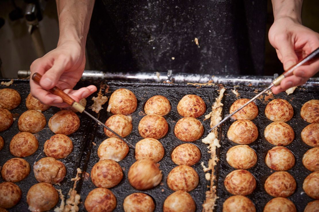 Takoyaki -- octopus balls -- are considered a must-eat street food in Osaka.