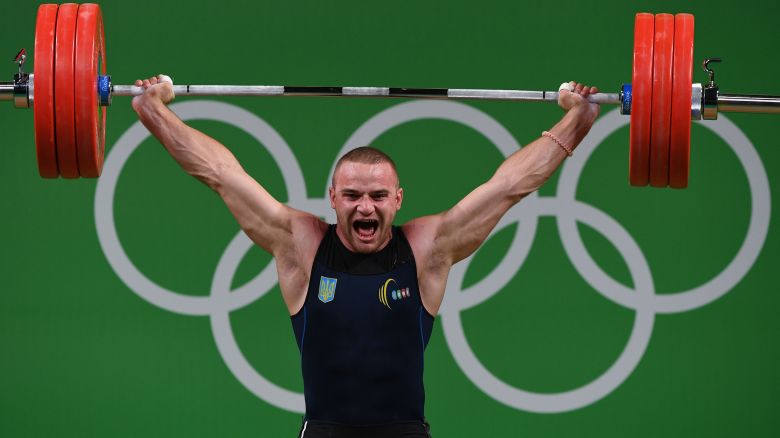 Ukraine's Oleksandr Pielieshenko competes during the men's weightlifting 85kg event during the Rio 2016 Olympics Games in Rio de Janeiro on August 12, 2016. / AFP / GOH Chai Hin        (Photo credit should read GOH CHAI HIN/AFP via Getty Images)