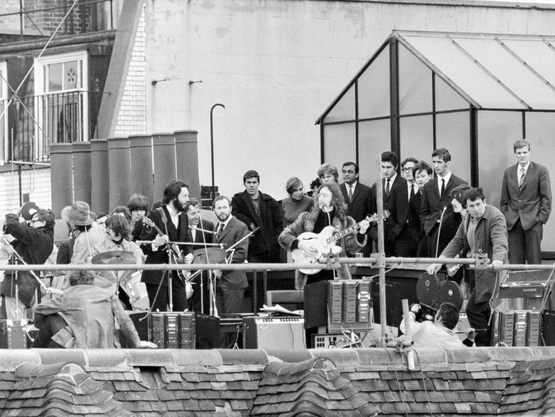 The Beatles, pictured on a London rooftop during their last live performance