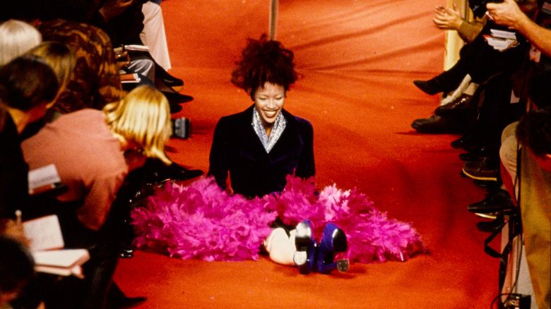 UNITED KINGDOM - CIRCA 1993: Naomi Campbell trip on the runway at the  Vivienne Westwood Fall 1993 RTW runway show. (Photo by Guy Marineau/Conde Nast via Getty Images)
