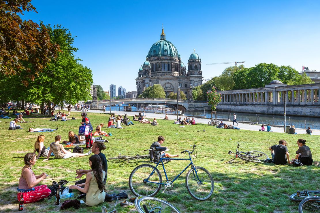 Berliners enjoying the sunshine on Museum Island in the German capital's Mitte district.