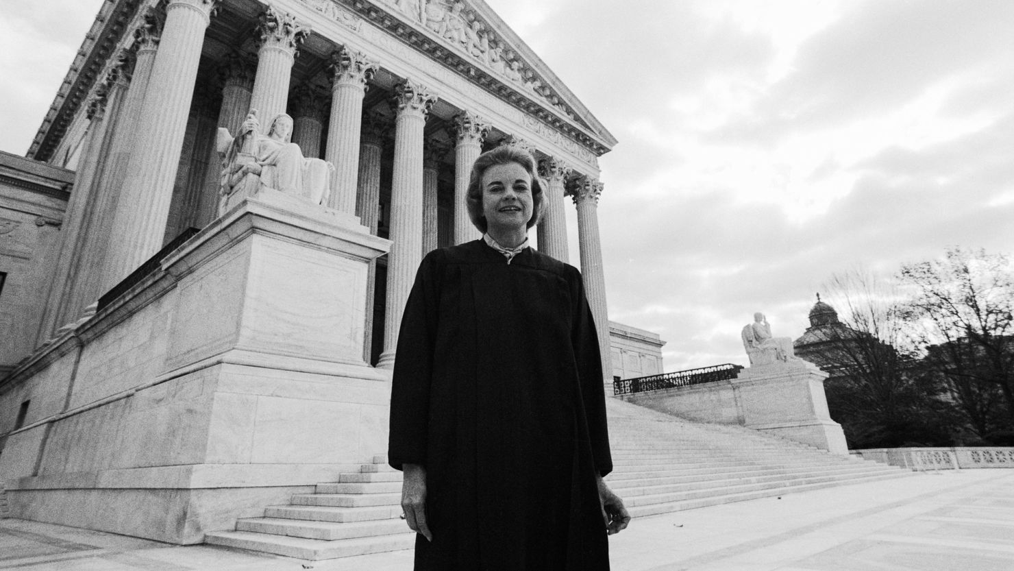 Newly appointed Supreme Court Justice Sandra Day O'Connor stands in front of the US Supreme Court Building following her being sworn in, September 25, 1981, in Washington, DC.
