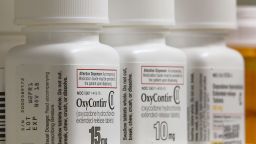 Bottles of Purdue Pharma L.P. OxyContin medication sit on a pharmacy shelf in Provo, Utah, on August 31, 2016.