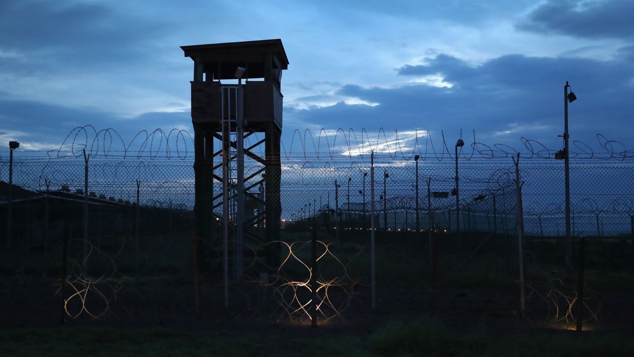 GUANTANAMO BAY, CUBA - OCTOBER 22: (EDITORS NOTE: Image has been reviewed by the U.S. Military prior to transmission.) Razor wire and a guard tower stands at a closed section of the U.S. prison at Guantanamo Bay, also known as "Gitmo" on October 22, 2016 at the U.S. Naval Station at Guantanamo Bay, Cuba. The U.S. military's t Task Force Guantanamo is holding 60 detainees at the prison, down from a previous total of 780. In 2008 President Obama issued an executive order to close the prison, which has failed because of political opposition in the U.S.  (Photo by John Moore/Getty Images)