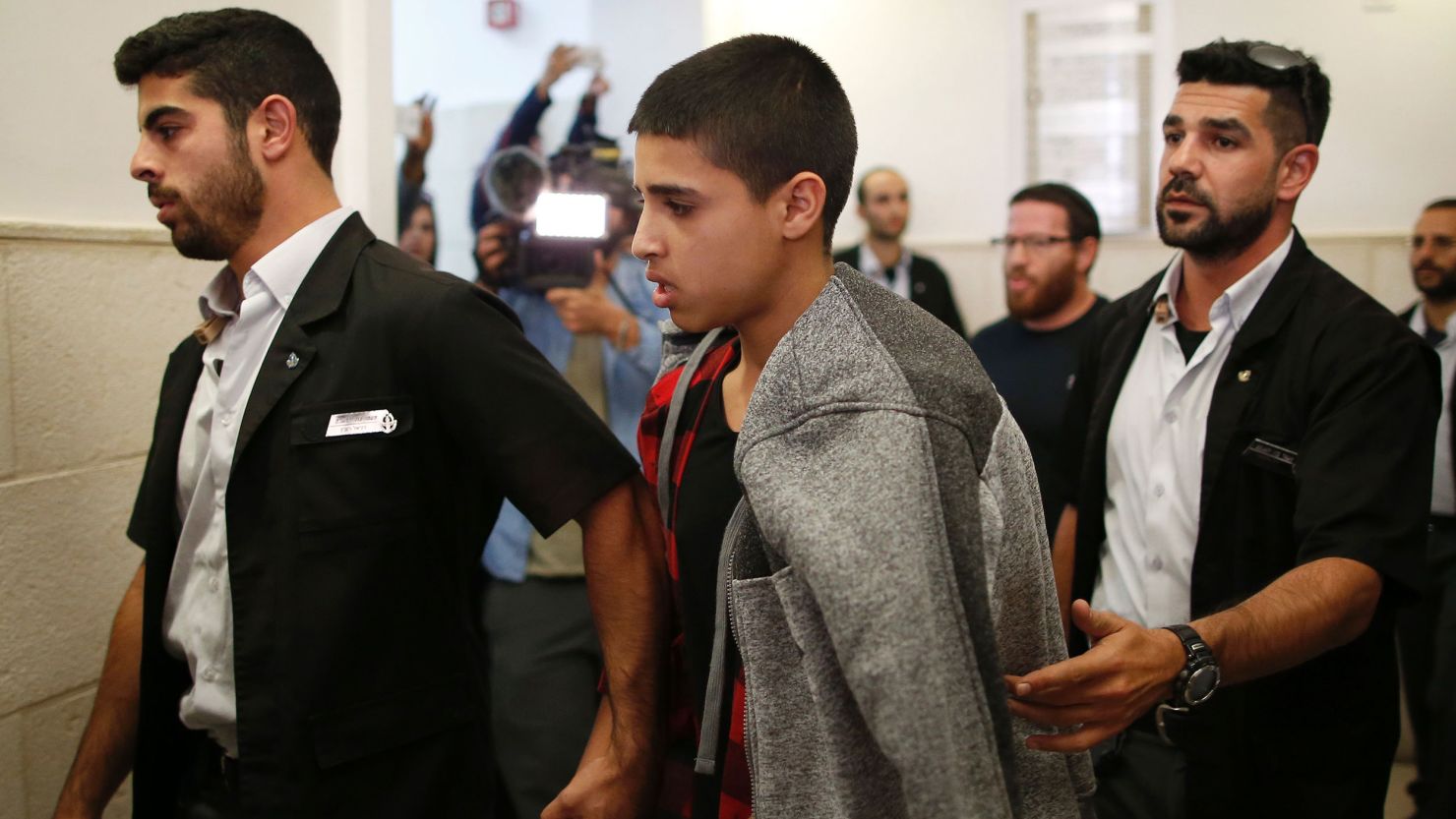 Ahmed Manasra leaves the District Court in Jerusalem after his sentencing hearing on November 7, 2016.
