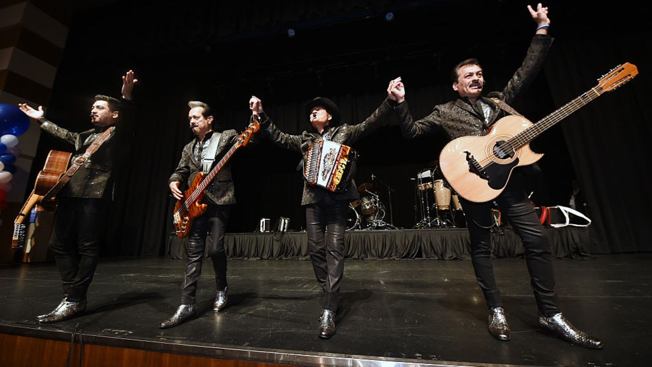 LAS VEGAS, NV - NOVEMBER 08:  (L-R) Recording artists Luis Hernandez, Hernan Hernandez, Jorge Hernandez and Eduardo Hernandez of the band Los Tigres del Norte perform at the Nevada Democratic Party's election results watch party at the Aria Resort & Casino on November 8, 2016 in Las Vegas, Nevada.  (Photo by Ethan Miller/Getty Images)