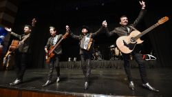 LAS VEGAS, NV - NOVEMBER 08:  (L-R) Recording artists Luis Hernandez, Hernan Hernandez, Jorge Hernandez and Eduardo Hernandez of the band Los Tigres del Norte perform at the Nevada Democratic Party's election results watch party at the Aria Resort & Casino on November 8, 2016 in Las Vegas, Nevada.  (Photo by Ethan Miller/Getty Images)