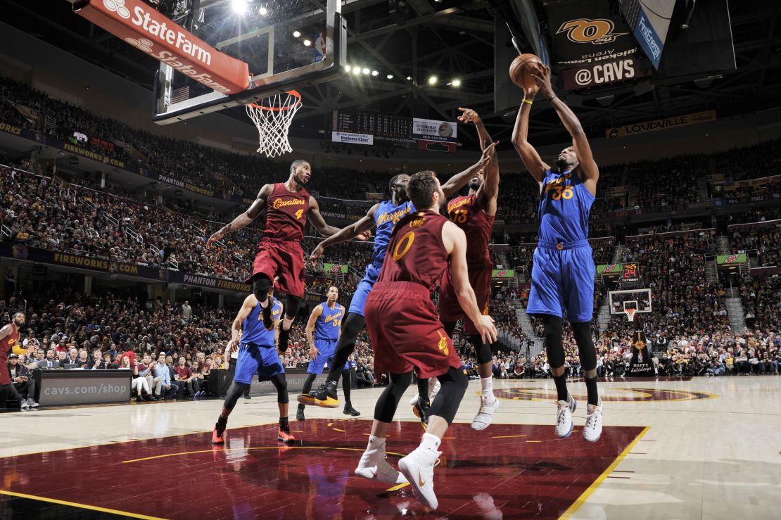 CLEVELAND, OH - DECEMBER 25: Kevin Durant #35 of the Golden State Warriors shoots the ball against the Cleveland Cavaliers during the game on December 25, 2016 at Quicken Loans Arena in Cleveland, Ohio. NOTE TO USER: User expressly acknowledges and agrees that, by downloading and/or using this Photograph, user is consenting to the terms and conditions of the Getty Images License Agreement. Mandatory Copyright Notice: Copyright 2016 NBAE (Photo by David Liam Kyle/NBAE via Getty Images)