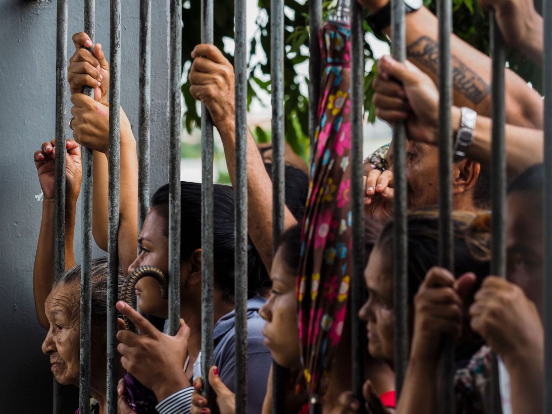Relatives are waiting for information after a riot ended with the killing of at least four prisoners inside the Desenbargador Raimundo Vidal Pessoa public prison in Manaus, Amazonas state, Brazil, on January 8, 2017. Deadly prison riots have escalated in Brazil since a cease-fire agreement between Brazil's two largest drug organizations, the First Capital Command (PCC) and the Red Command (CV), collapsed.