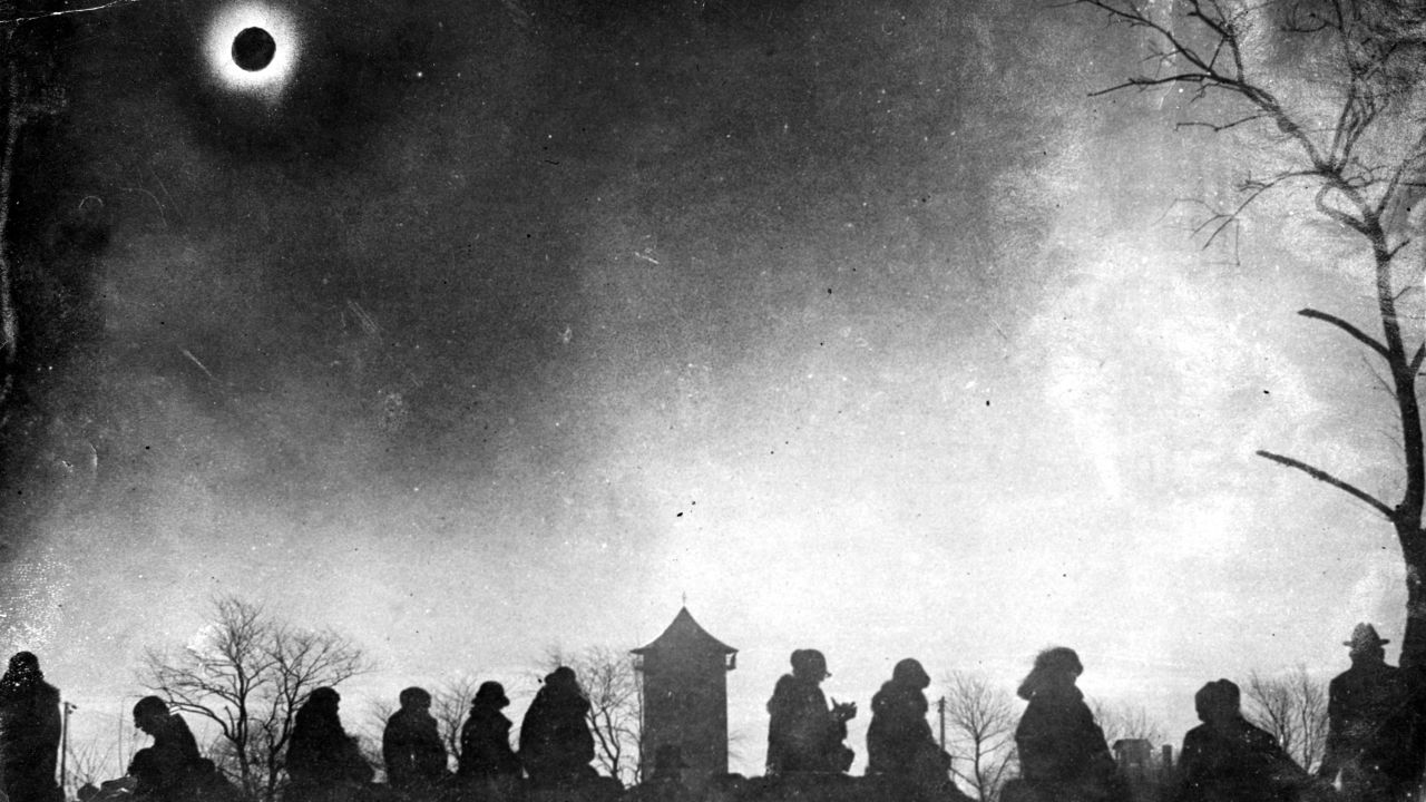 A group of people gathered in zero degree weather to watch the solar eclipse, showing the corona, at Vose Field in Westerly, R.I., at around 9:30 a.m., on Jan. 24, 1925. An estimated 10,000 visitors came to watch the event.