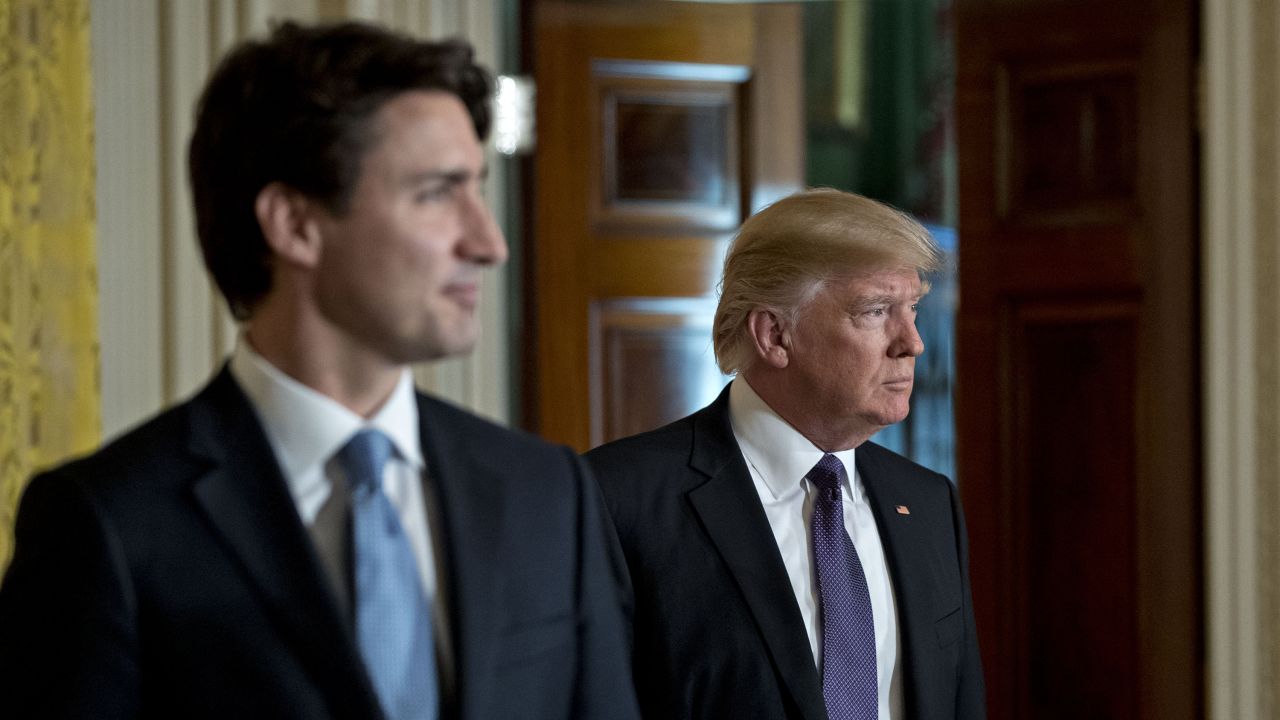 U.S. President Donald Trump, right, and Justin Trudeau, Canada's prime minister, arrive to a news conference in the East Room of the White House in Washington, D.C., U.S., on Monday, Feb. 13, 2017. Amid talk in the U.S. of resetting trade relationships, Trump and Trudeau said both countries are committed to maintaining trade ties and economic integration that support millions of jobs on both sides of the border. Photographer: Andrew Harrer/Bloomberg via Getty Images