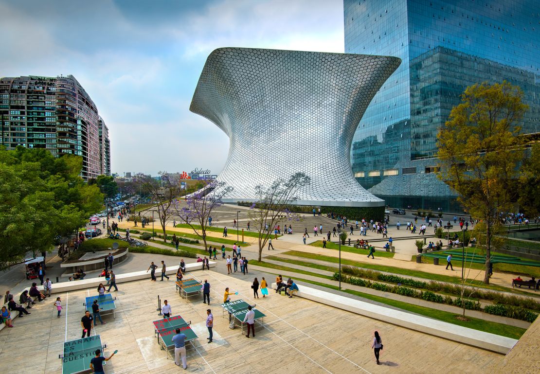 Mexico regularly ranks highly among countries offering satisfaction for expats. The aluminum-paneled Soumaya Museum stands in Plaza Carso in the Polanco district of Mexico City.