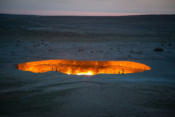 <strong>Darvaza Gas Crater:</strong> Some 50 years ago, a Soviet exploratory team drilled for natural gas and set off a chain reaction that created this giant, fiery hole.