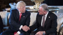 In this 2017 photo, Donald Trump shakes hands with Keith Kellogg in Florida. 