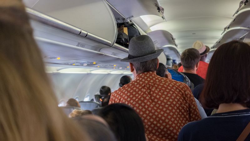Stand up on the plane too early? You could be risking a fine