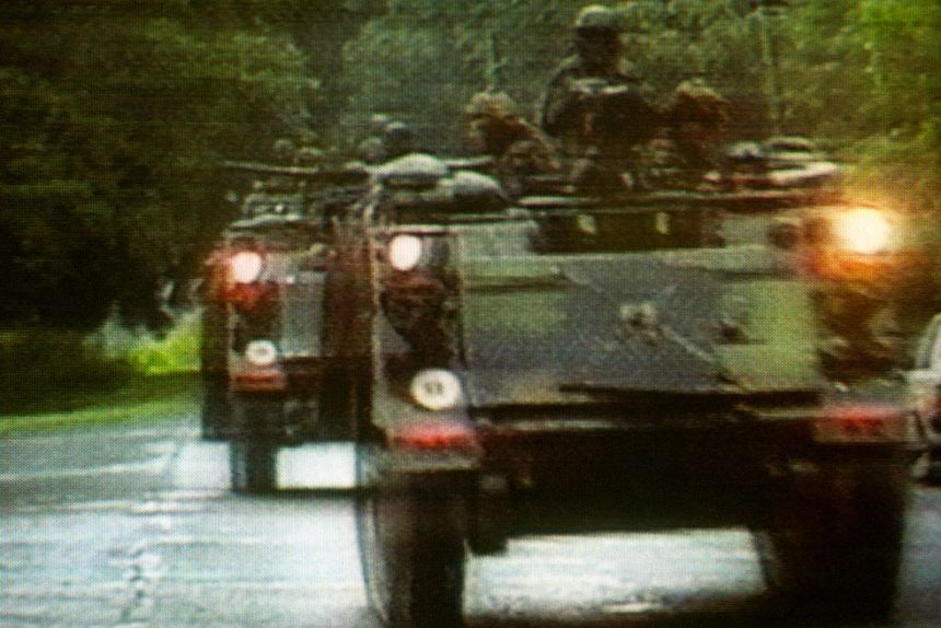 US troops move through Panama City in early December 20, 1989 after President George H.W. Bush ordered US forces to intervene in Panama and apprehend strongman General Manuel Noriega.