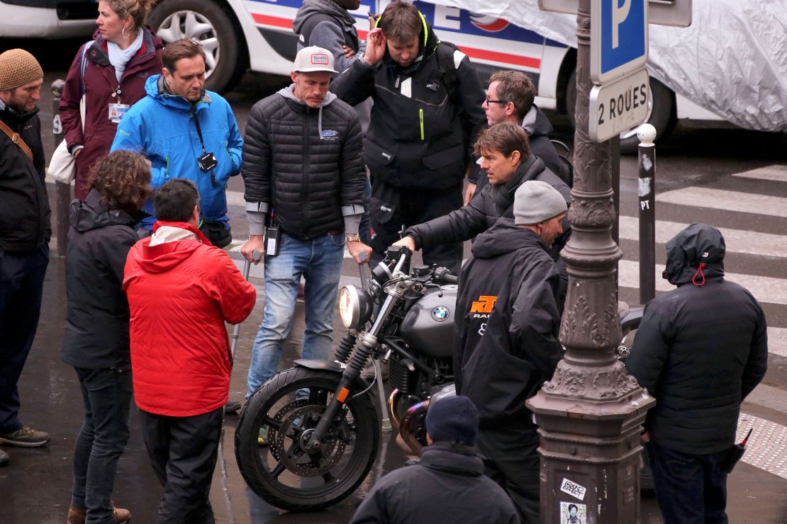 Tom Cruise pictured on a motorcycle while filming “Mission: Impossible — Fallout” in Paris in May 2017.