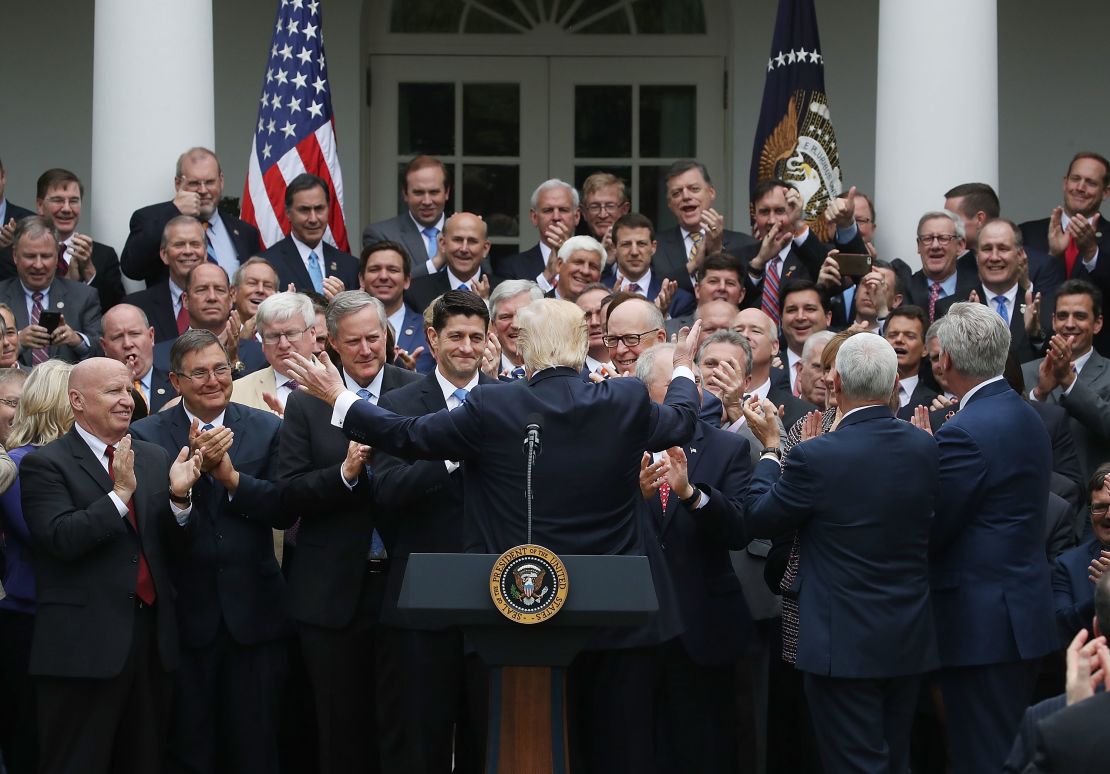 President Donald Trump congratulates House Republicans during an event in the Rose Garden after they passed legislation aimed at repealing and replacing the Affordable Care Act on May 4, 2017.