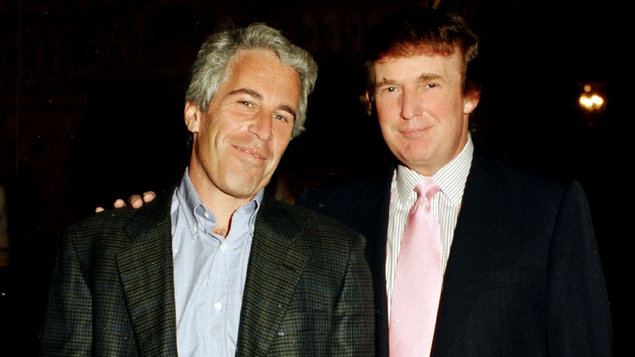 Portrait of American financier Jeffrey Epstein (left) and real estate developer Donald Trump as they pose together at the Mar-a-Lago estate, Palm Beach, Florida on February 22, 1997. (Photo by Davidoff Studios/Getty Images)