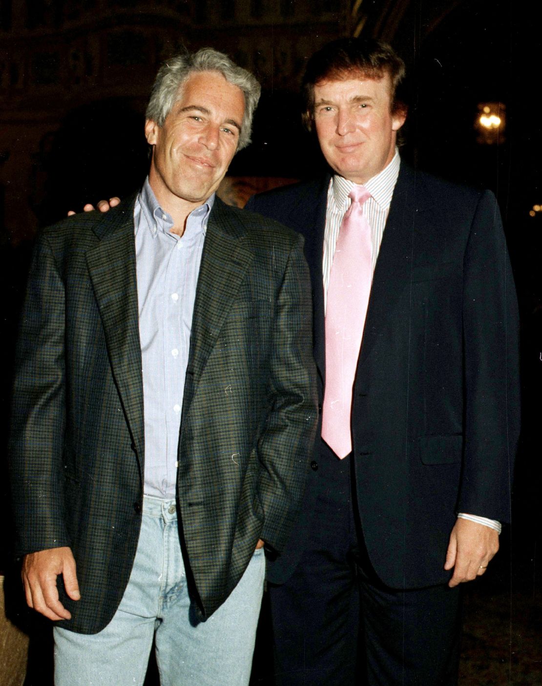 Some MAGA media personalities now claim the Trump administration is trying to cover up the truth about Jeffrey Epstein, pictured here with Donald Trump at Mar-a-Lago in 1997.