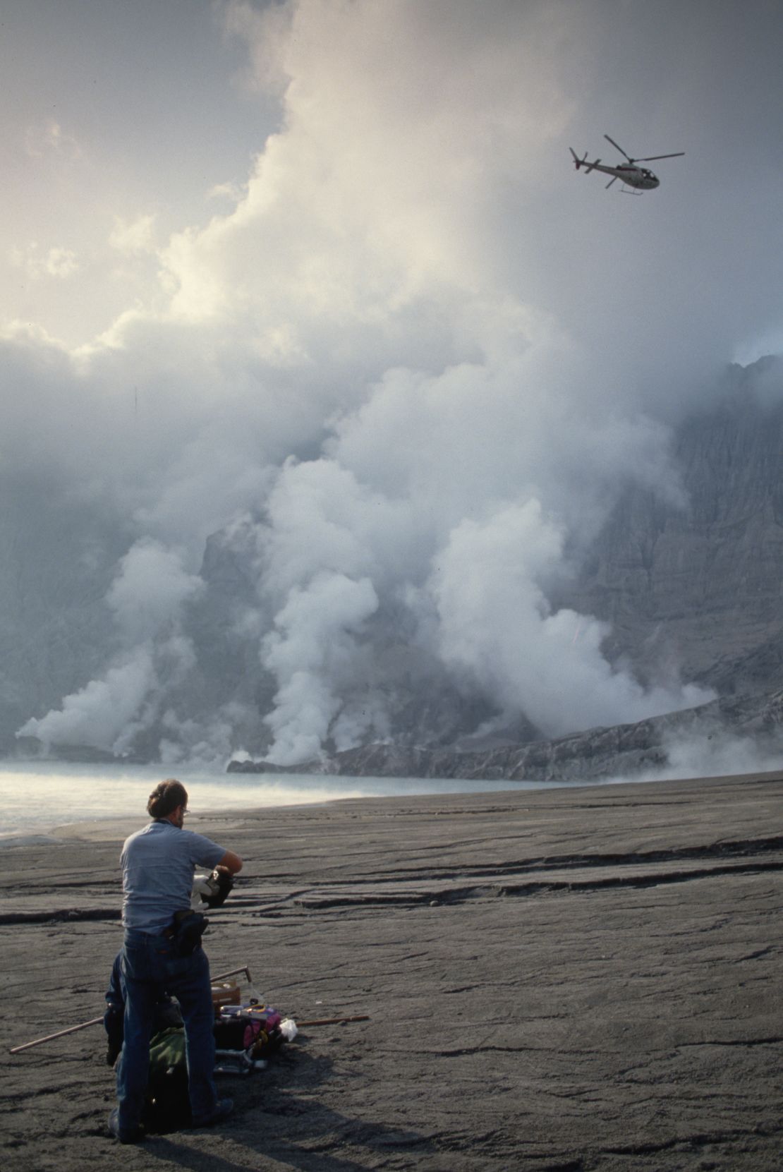 Volcanologist Chris Newhall works in the caldera of Mount Pinatubo taking air and water samples on February 18, 1992.