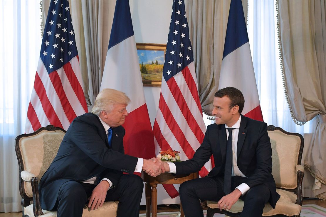 The infamous lengthy handshake between then-US President Donald Trump and French President Emmanuel Macron on the sidelines of the NATO summit, in Brussels, 2017.
