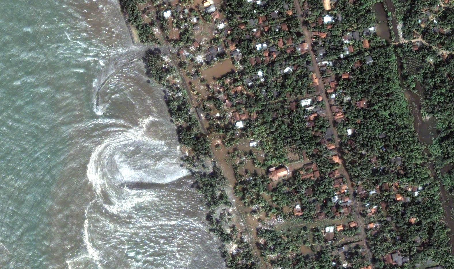 This satellite image shows extensive flooding in Kalutara, Sri Lanka, when a tsunami struck its coast on December 26, 2004.