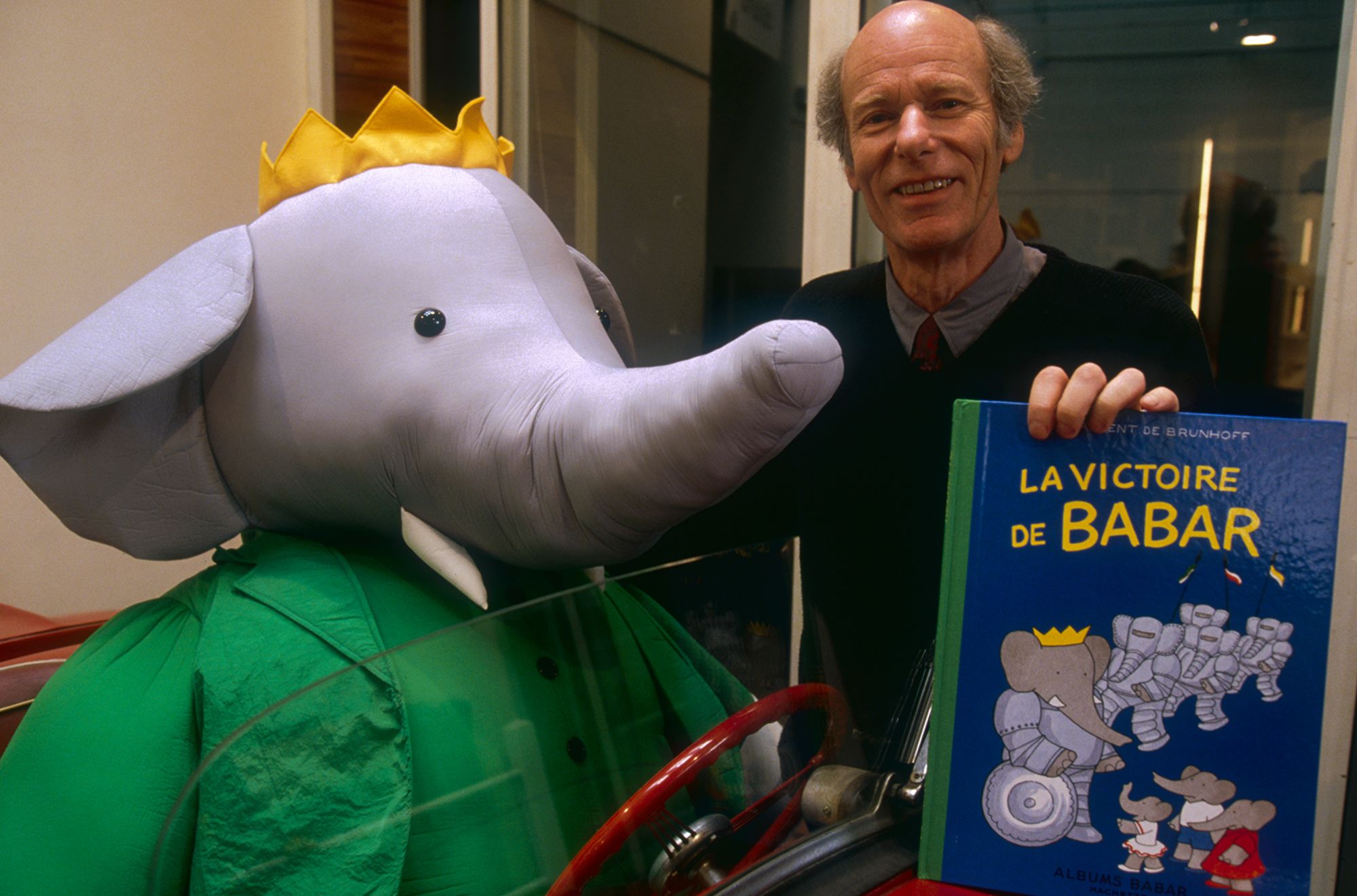 Laurent de Brunhoff presents his 1992 book "La Victoire de Babar" (sold in English as "Babar's Battle"), a publication marking the 60th anniversary of his father Jean's famous character, Babar.