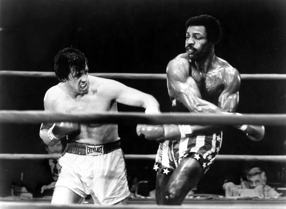 Sylvester Stallone and Carl Weathers perform a boxing scene in the movie "Rocky" directed by John G. Avildsen.