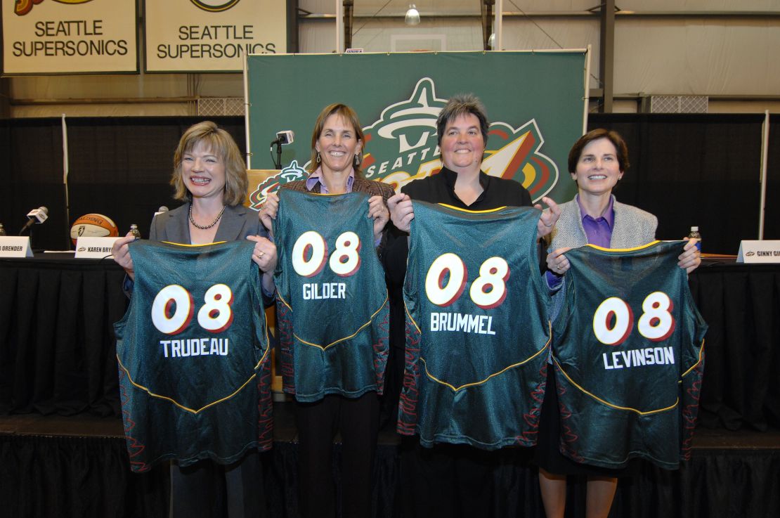 New owners of the Seattle Storm Anne Levinson, Dawn Trudeau, Lisa Brummel, and Ginny Gilder hold up personalized Storm Jerseys at a press conference on January 8, 2008 in Seattle, Washington.