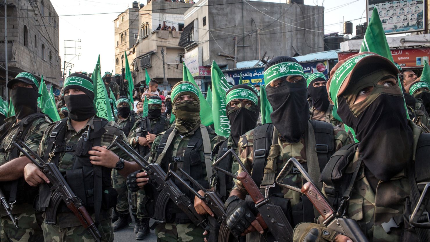 Palestinian Hamas militants are seen during a military show in the Bani Suheila district on July 20, 2017 in Gaza City, Gaza.