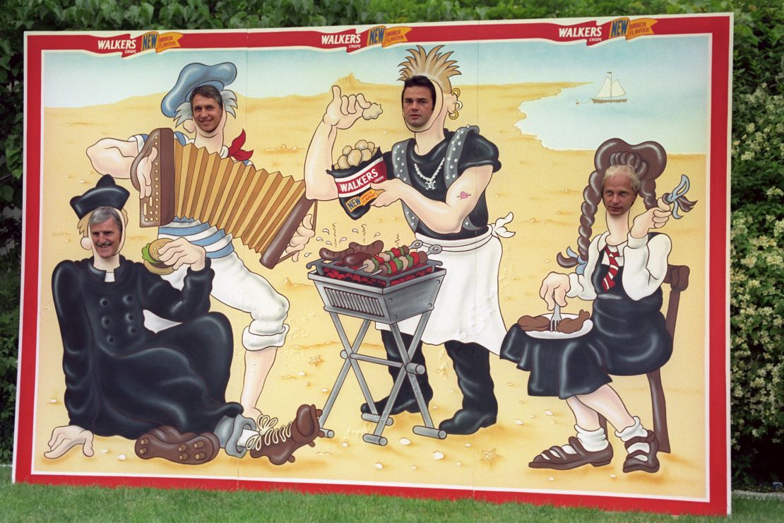 Former soccer star Gary Lineker, second left, joins other UK sporting world personalities at the launch of Walker's new barbecue-flavored crisps in 1996.