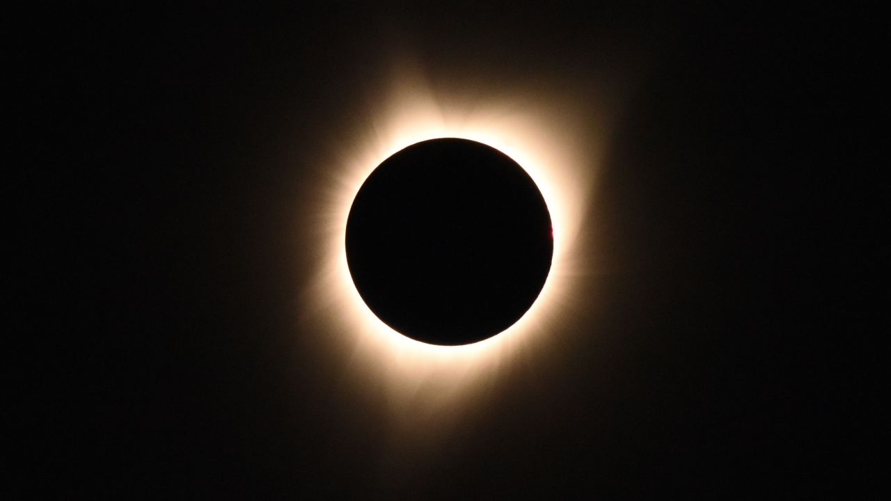 The sun's corona is visible as the moon passes in front of the sun during a total solar eclipse at Big Summit Prairie ranch in Oregon's Ochoco National Forest near the city of Mitchell on August 21, 2017. The Sun started to vanish behind the Moon as the partial phase of the so-called Great American Eclipse began Monday, with millions of eager sky-gazers soon to witness "totality" across the nation for the first time in nearly a century. / AFP PHOTO / Robyn Beck (Photo credit should read ROBYN BECK/AFP via Getty Images)