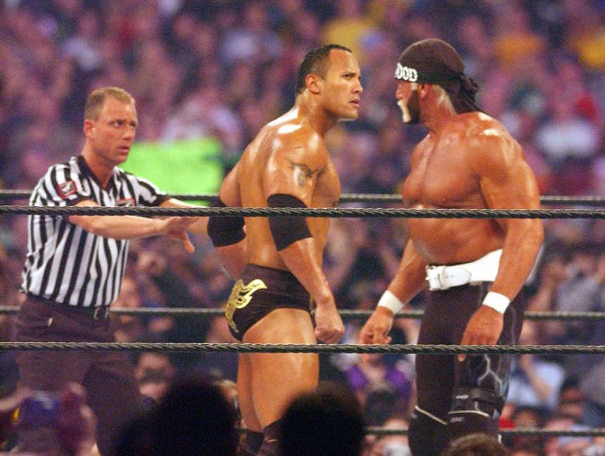 Hogan, in his badder "Hollywood" persona, takes on The Rock in an iconic match at WrestleMania X8 in 2002.