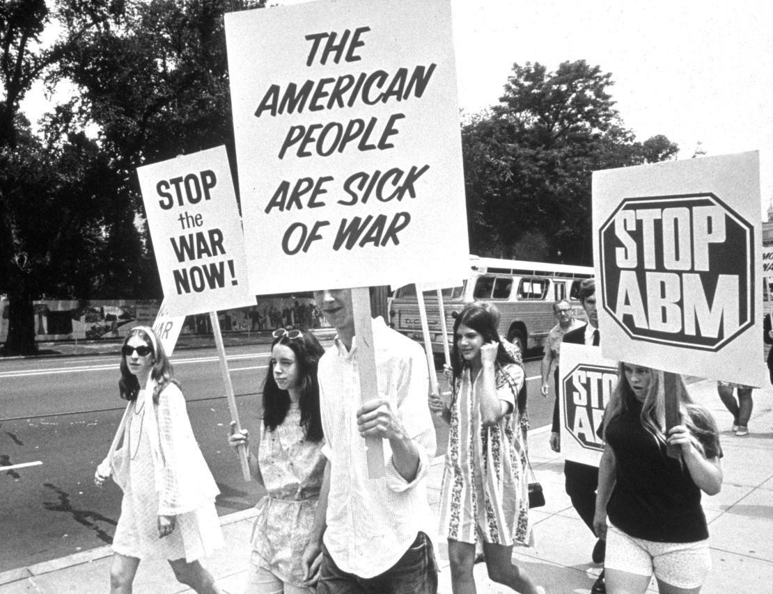 Students march with anti-war placards on the campus of the University of California at Berkeley, California, 1969.