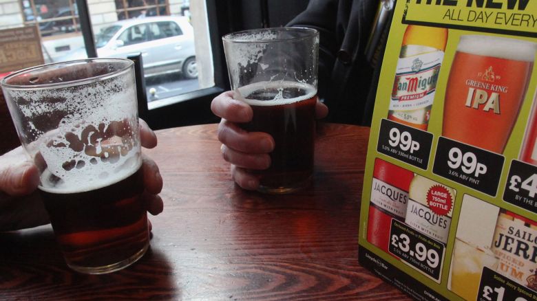 BRISTOL, ENGLAND - JANUARY 05:  Drinkers enjoy pints of beer which is currently being sold in outlets of the pub chain JD Wetherspoon for 99p a pint on January 5, 2009 in Bristol, England. The company, which operates 713 pubs across the UK, claims it is offering cash-strapped drinkers some cheer, offering "indefinite" reductions on some beer, bottled lager, wine and spirits, plus 2.99 GBP meals. However health charities claim the move may spark a price war and lead to more irresponsible and binge drinking.  (Photo by Matt Cardy/Getty Images)