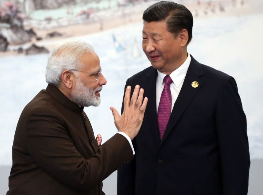 Indian Prime Minister Narendra Modi greets Chinese President Xi Jinping prior to the dinner on September 4, 2017 in Xiamen, China. Ties between India and China are cautiously improving after relations cratered in 2020.