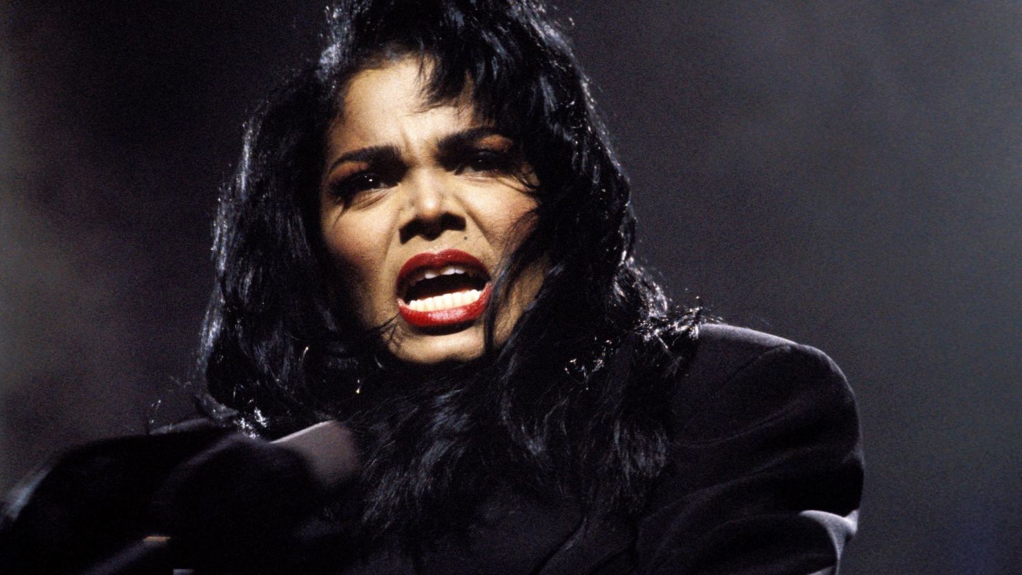 NETHERLANDS - 4th OCTOBER: American singer Janet Jackson performs live on stage at Ahoy in Rotterdam, Netherlands during her Rhythm Nation World tour on 4th October 1990. (Photo by Michel Linssen/Redferns)