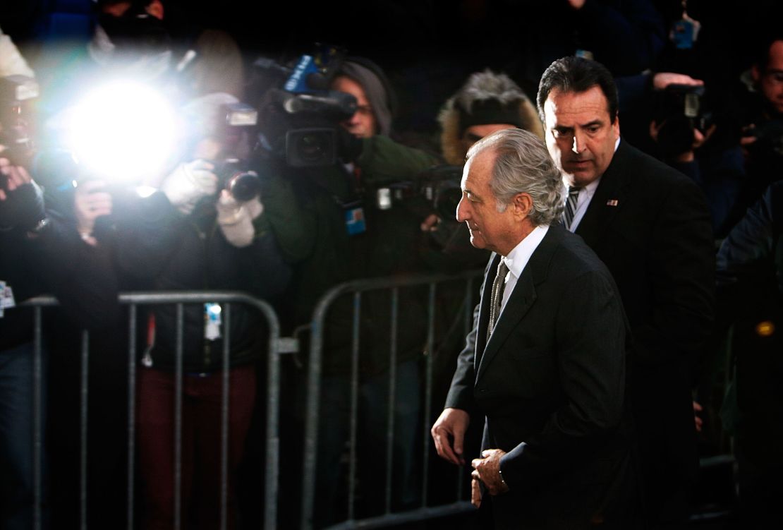 Bernie Madoff, known for bilking thousands of investors out of billions of dollars, arrives at Manhattan federal court on March 12, 2009.