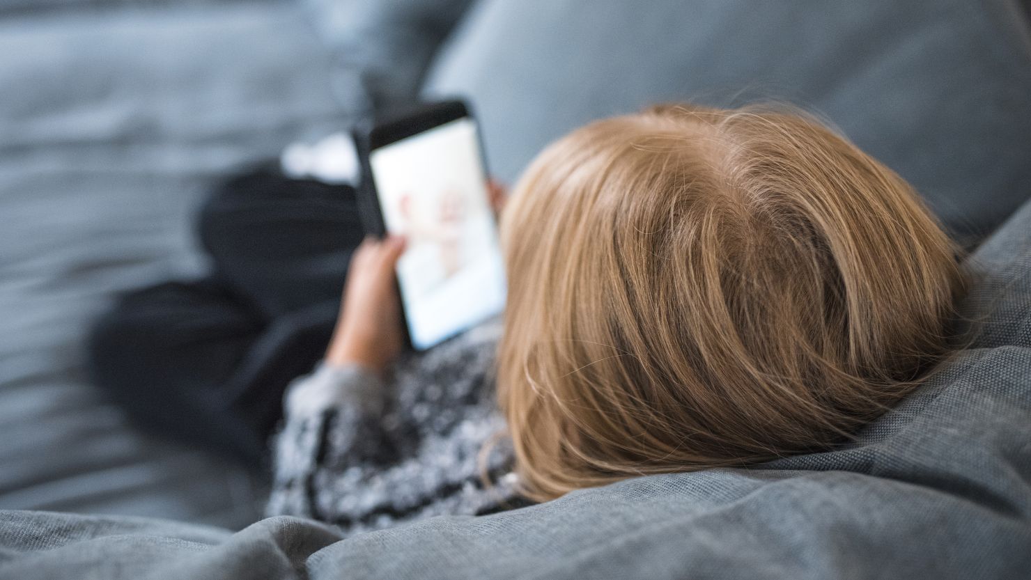 Being on a phone once in bed can be detrimental to a child's sleep, according to a new study.