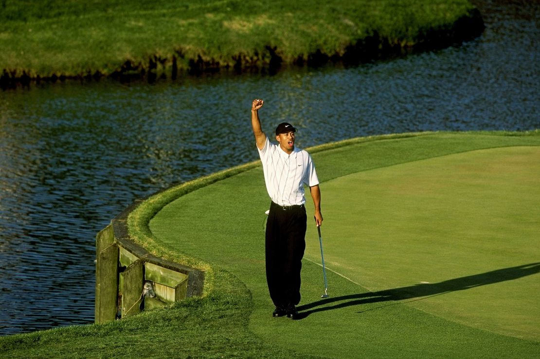 Woods celebrates his now-iconic putt.